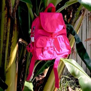 Hot pink mini Kipling backpack w/ gorilla keychain
